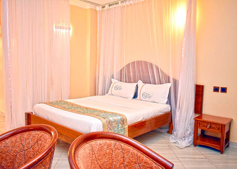 Two Oceans Hotel luxury room interior with modern furnishings and Taita Hills view